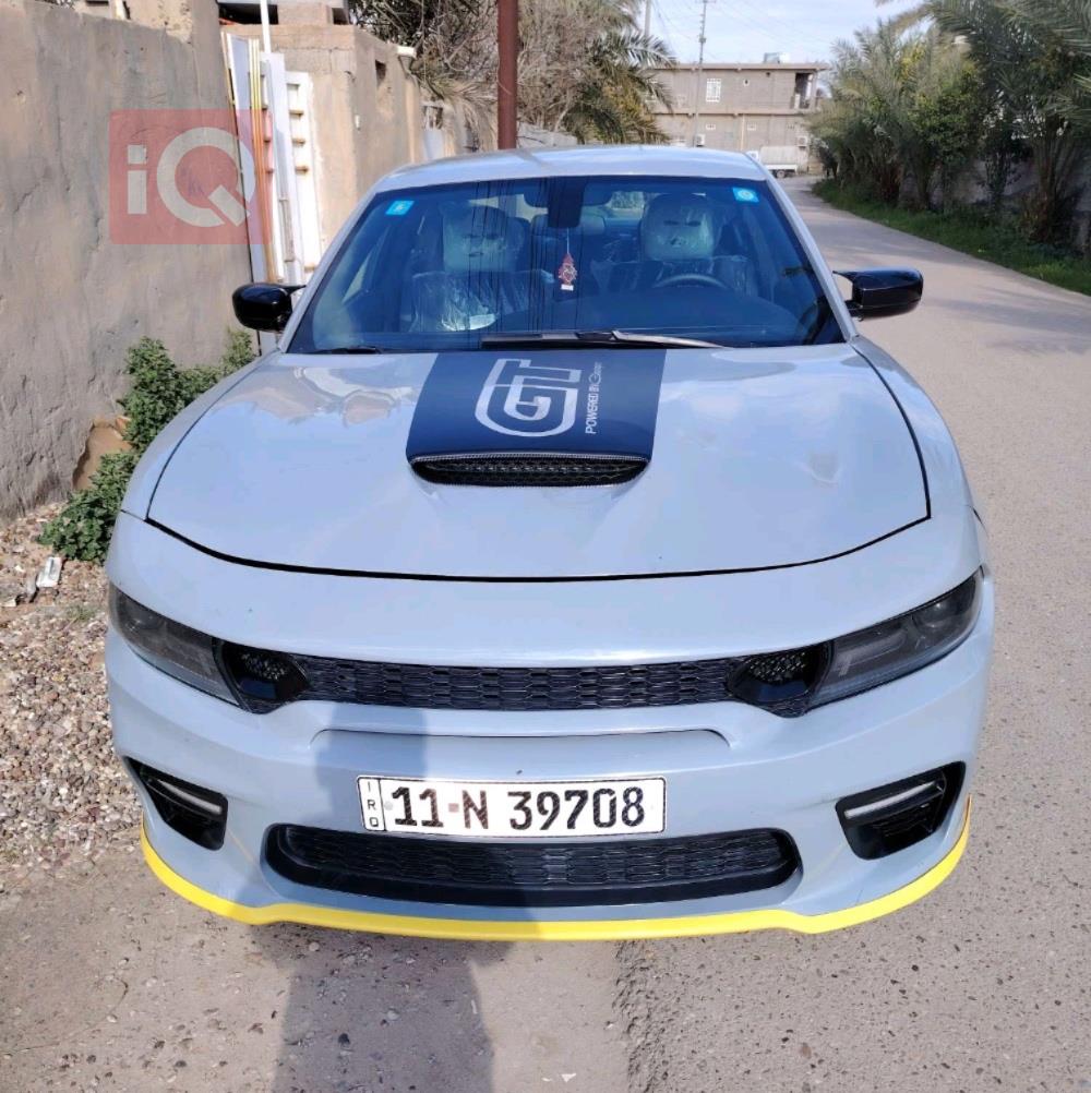 دۆج چارجەر